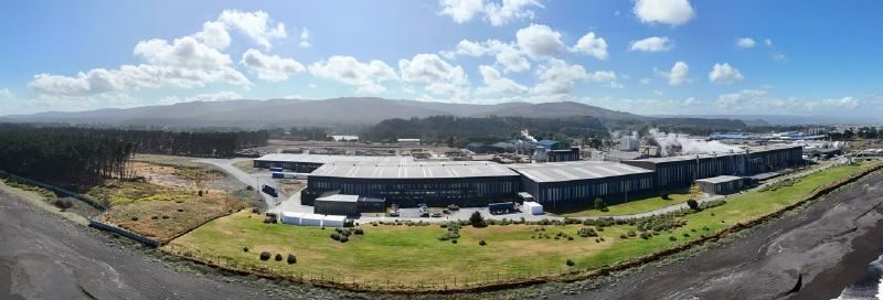 A building with a grassy area

AI-generated content may be incorrect.