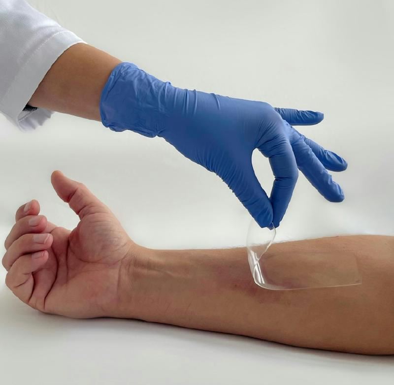 A person wearing blue gloves and a white coat
AI-generated content may be incorrect.